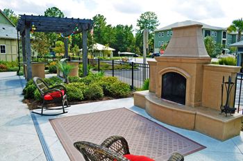 Outdoor fireplace w/ soft seating